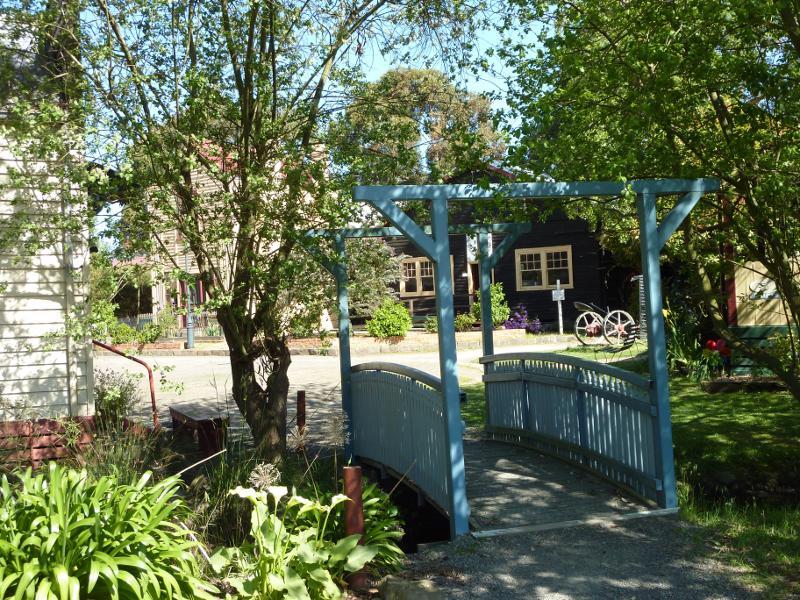Moe - Gippsland Heritage Park, Lloyd Street: Footbridge near general store and coach builder's workshop