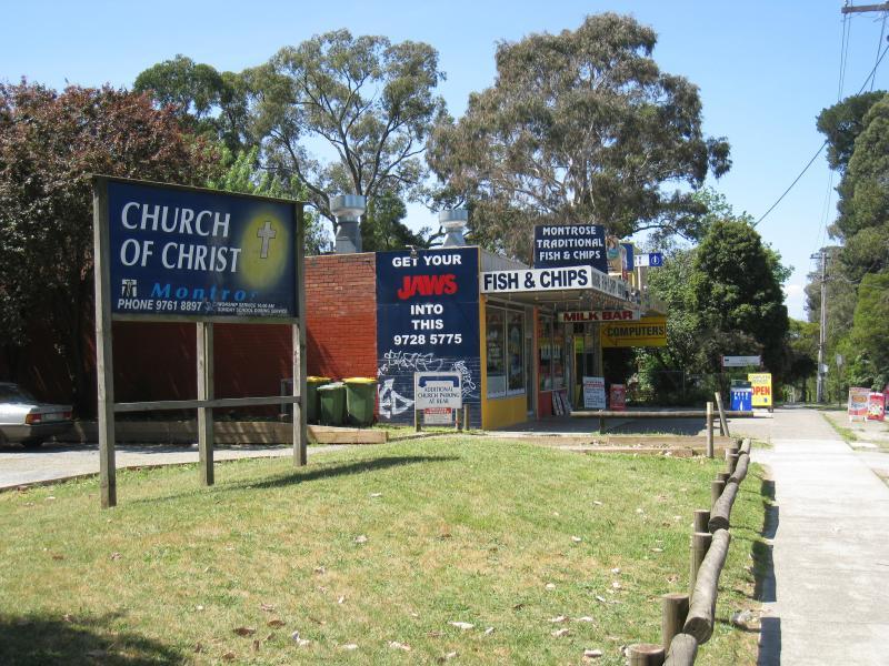 Montrose - Leith Road between Montrose Road and Trevallyn Close: View north-east along Leith Rd towards shops next to church