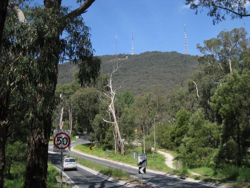 Montrose - Around Montrose: View east along Glasgow Rd towards Sheffield Rd and transmission towers on Mt Corhanwarrabul