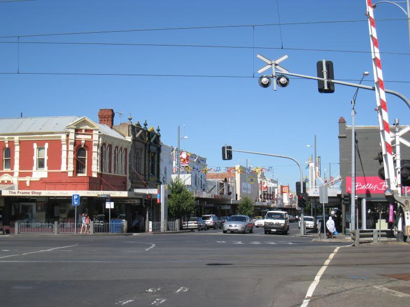 Moonee Ponds - Shops and commercial centre, Puckle Street and adjoining streets: View east along Puckle St at railway crossing