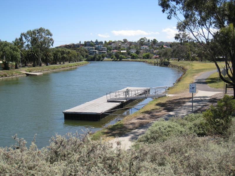 Moonee Ponds - Maribyrnong River at bridge on Maribyrnong Road: View south-west along river at jetty