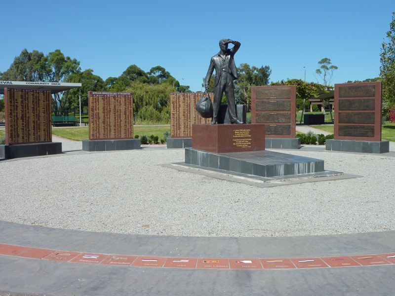 Morwell - Immigration Park, Princes Drive: Migrant statue surrounded by Wall of Recognition