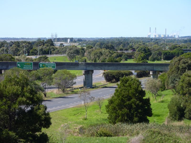Morwell - Princes Freeway around Morwell: View east along Princes Fwy towards railway bridge and Monash Way exit