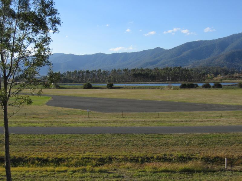 Mount Beauty - Regulating Pondage, Embankment Drive: View towards airstrip and lake from northern wall of pondage