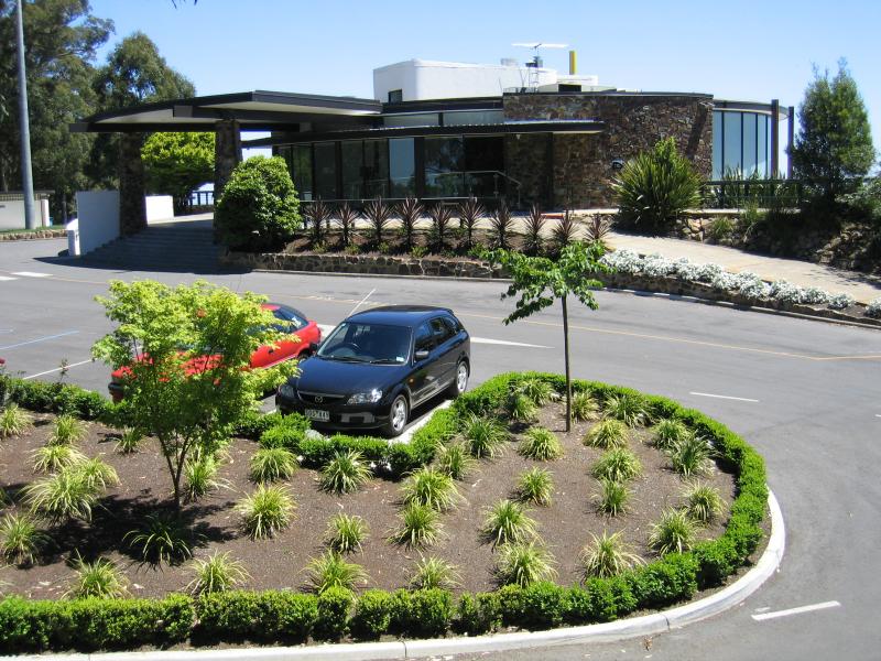 Mount Dandenong - Mount Dandenong Observatory, lookout and cafe/restaurant: View towards entrance of Sky High Restaurant and car park from footbridge
