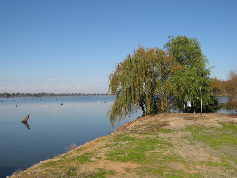 Nagambie - Goulburn Weir Road at irrigation channel - View south across lake