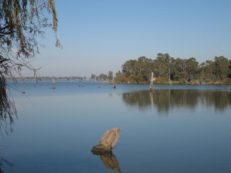 Nagambie - Goulburn Weir Road at irrigation channel: View south across lake