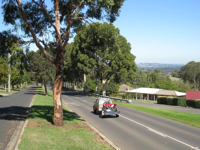 Neerim South - Main Neerim Road, northern side of town: View south along Main Neerim Rd at Eton Ct