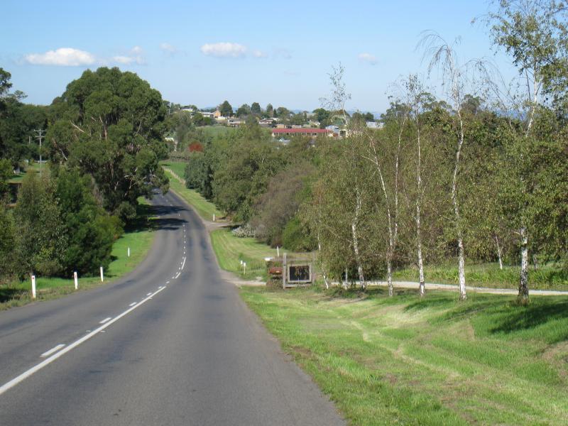 Neerim South - Main Neerim Road, northern side of town: View south along Main Neerim Rd at northern end of town