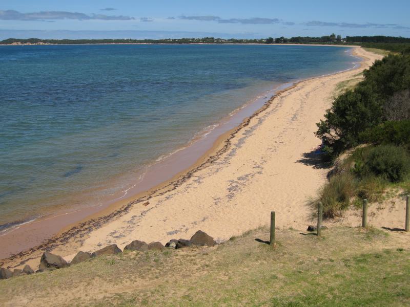Newhaven - Coast south of Phillip Island Bridge: View south-west along coast towards Cape Woolamai from Phillip Island Rd