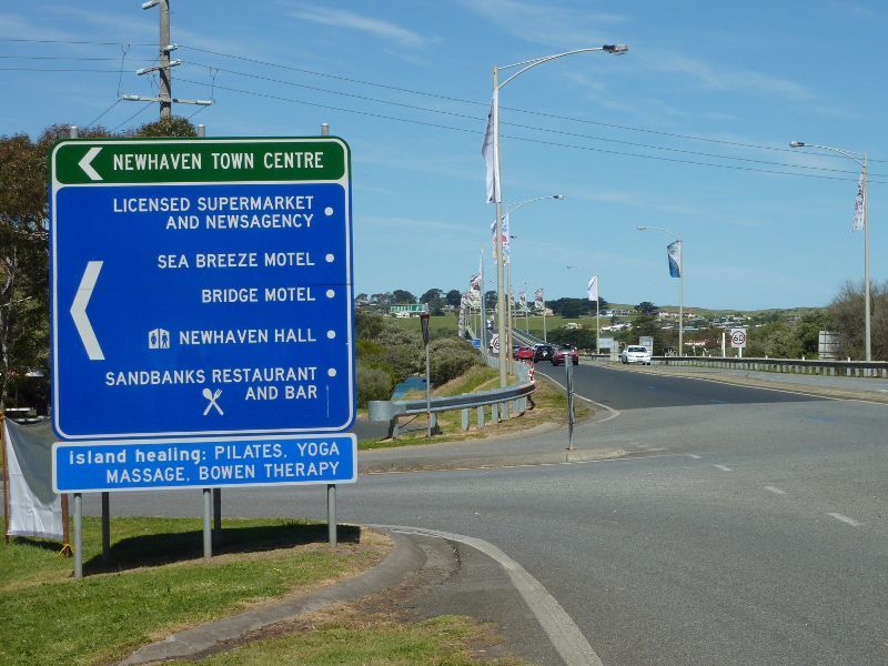 Newhaven - Phillip Island Road through Newhaven - View south-east along Phillip Island Rd at Forrest Av towards Phillip Island Bridge