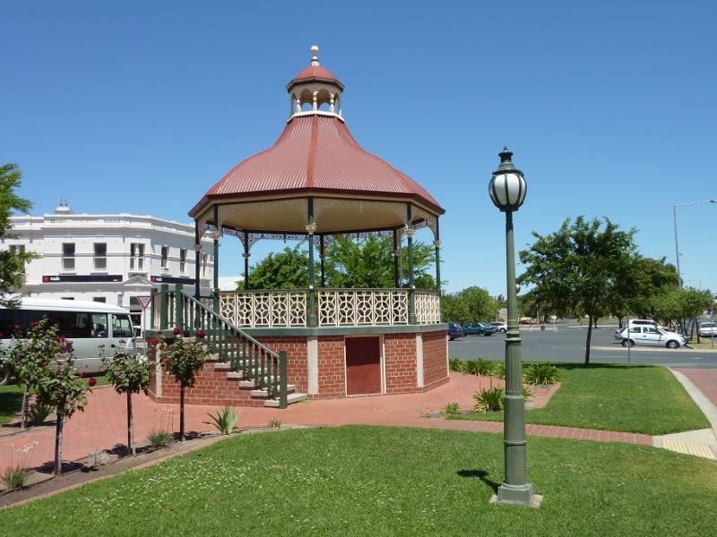 Nhill - Shops and commercial centre, Victoria Street and Nelson Street: View south-west through gardens in centre of Victoria St towards rotunda