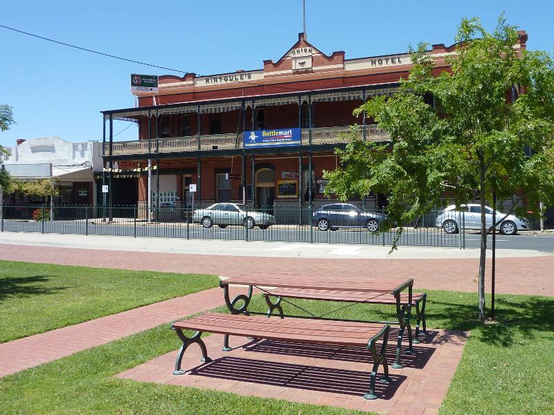Nhill - Shops and commercial centre, Victoria Street and Nelson Street: View east across gardens in centre of Victoria St towards Union Hotel