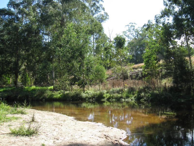 Noojee - Parkland along La Trobe River, east side of Bennett Street: Sandy beach at bend in river near BBQ shelter