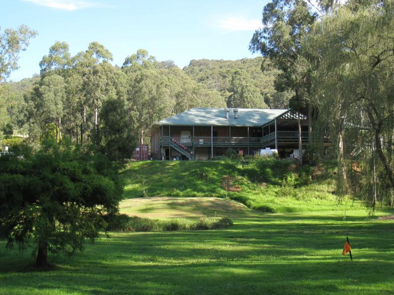 Noojee - Noojee Hotel and surroundings, Mount Baw Baw Road: View across riverfront parkland towards rear of hotel