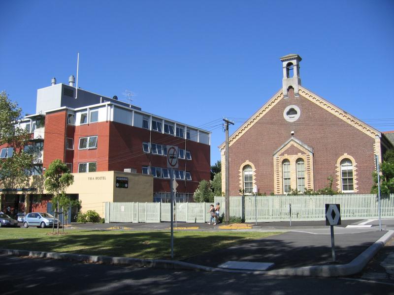 North Melbourne - Queensberry Street area: View north along Howard St at Queensberry St towards YHA Hostel