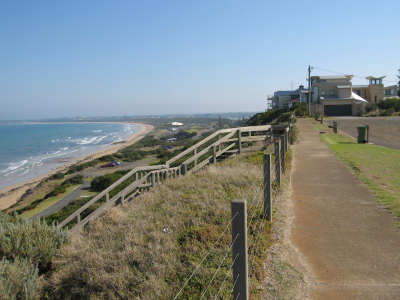 Ocean Grove - Views from lookout above Smiths Beach, Lookout Reserve Road: View west along cliff top and coast
