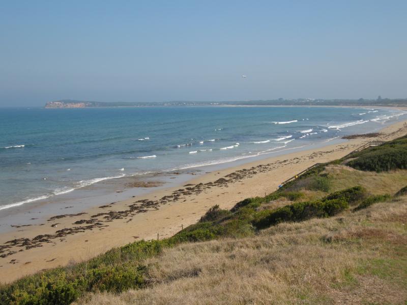 Ocean Grove - Smiths Beach: View south-west along coast towards The Bluff from foreshore at end of Presidents Av
