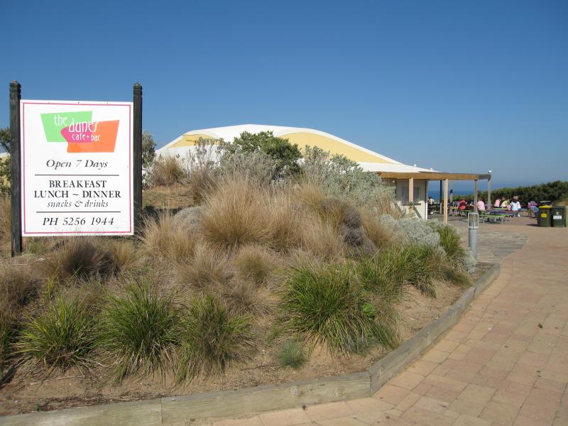 Ocean Grove - Surf Beach along Surf Beach Road and at Ocean Grove Surf Life Saving Club (SLSC): View towards The Dunes Cafe & Bar from car park