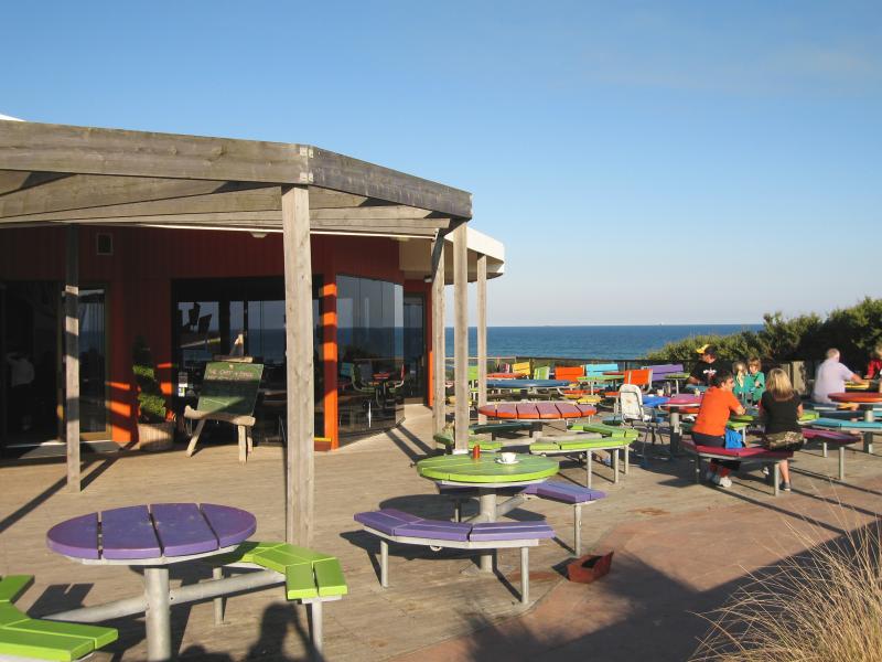 Ocean Grove - Surf Beach along Surf Beach Road and at Ocean Grove Surf Life Saving Club (SLSC): Outdoor seating at The Dunes Cafe & Bar overlooking beach