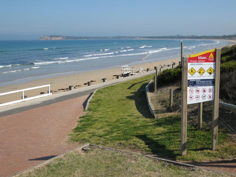 Ocean Grove - Surf Beach along Surf Beach Road and at Ocean Grove Surf Life Saving Club (SLSC): View south-west along coast near SLSC