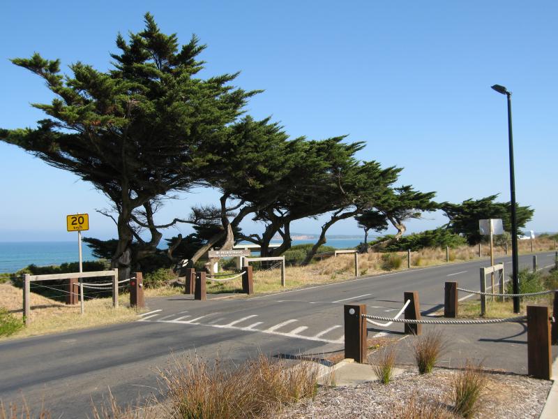 Ocean Grove - Surf Beach along Surf Beach Road and at Ocean Grove Surf Life Saving Club (SLSC): View west along Surf Beach Rd between Presidents Av and Field St
