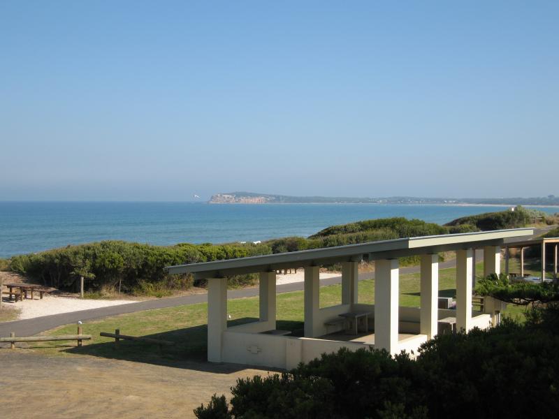 Ocean Grove - Surf Beach along Surf Beach Road and at Ocean Grove Surf Life Saving Club (SLSC): View south-west across foreshore from shelter near end of Presidents Av