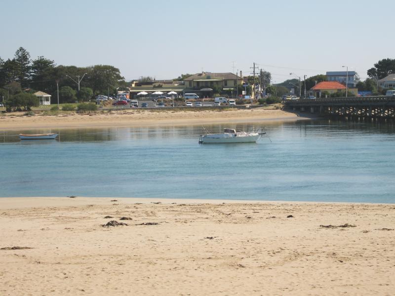 Ocean Grove - Sandy Point at Barwon River mouth: View west across river at Barwon Heads Bridge