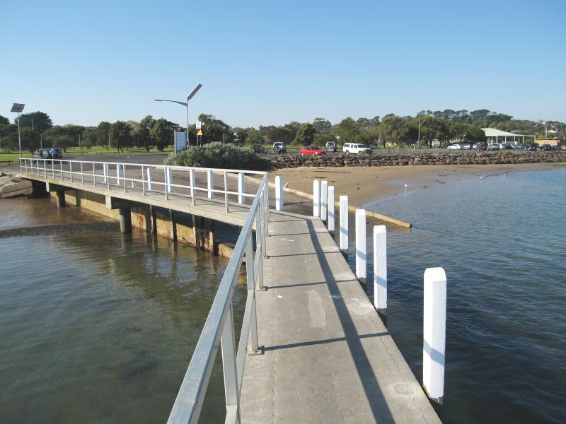 Ocean Grove - Jetty and boat ramp area, Barwon River, Guthridge Street and Peers Crescent: View along jetty back to shore and boat ramp