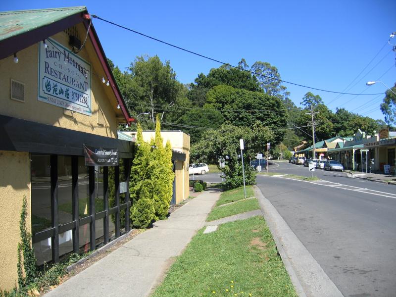 Olinda - Commercial centre and shops, Mt Dandenong Tourist Road at Monbulk Road: View west along Monbulk Rd towards Mt Dandenong Tourist Rd