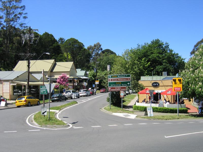 Olinda - Commercial centre and shops, Mt Dandenong Tourist Road at Monbulk Road: View east along Monbulk Rd at Mt Dandenong Tourist Rd
