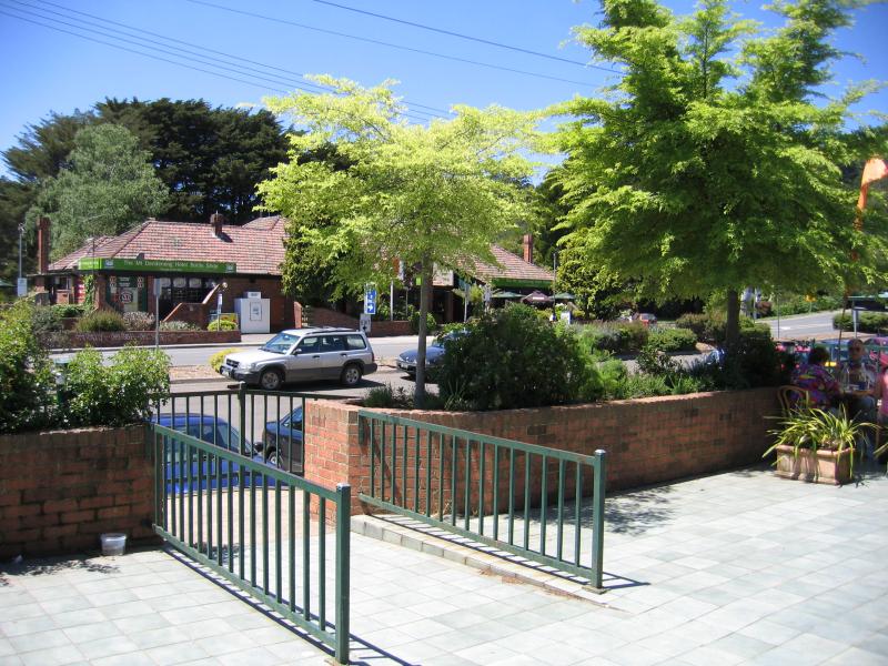Olinda - Commercial centre and shops, Mt Dandenong Tourist Road at Ridge Road: View east from shops across to Mt Dandenong Hotel