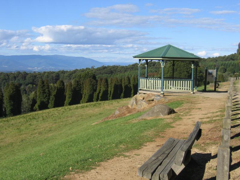 Olinda - R.J. Hamer Forest Arboretum, Chalet Road: View east towards rotunda at car park