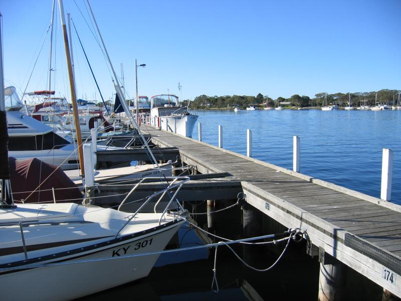 Paynesville - McMillans Strait foreshore: Boats moored at the marina, just north of the Raymond Island Ferry