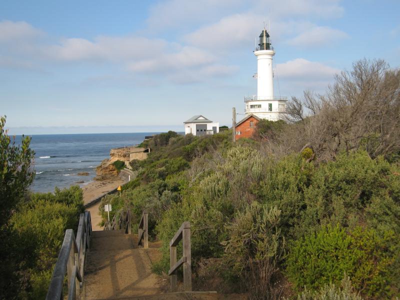 Point Lonsdale - Coastal path from Rip View Lookout to Point Lonsdale Pier: Steps down from path towards pier entrance and lighthouse