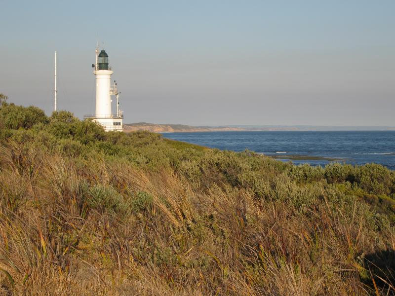 Point Lonsdale - Surf Back Beach at Stoneman Reserve, Ocean Road: View east along foreshore towards lighthouse