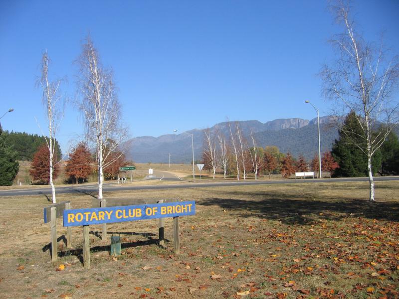Porepunkah - Great Alpine Road, Buckland Valley Road and Mount Buffalo Road junction: View south-west towards Buckland Valley Rd with Mt Buffalo in background