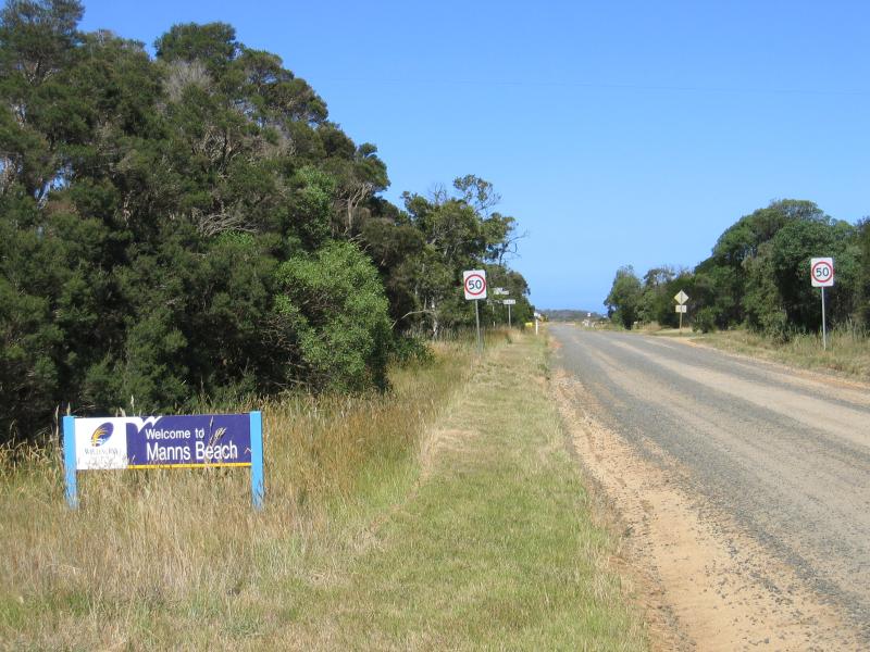 Port Albert - Manns Beach: Manns Beach town sign, view east along Manns Beach Rd