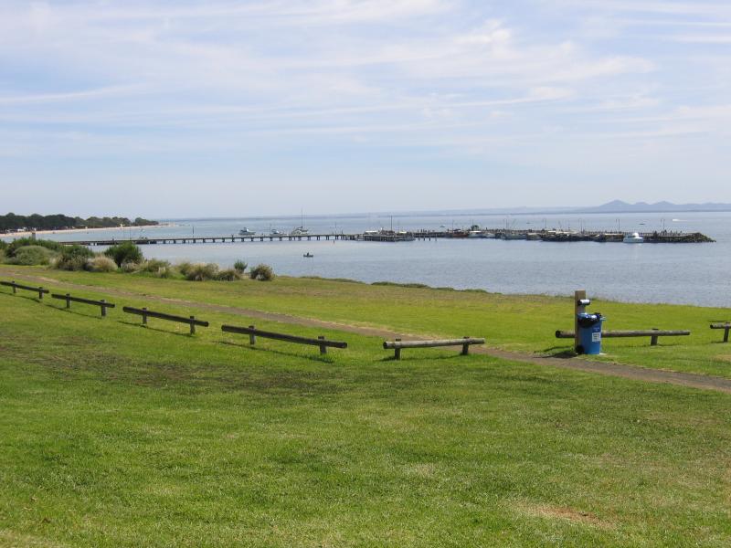 Portarlington - The Esplanade coastal road: View west along foreshore towards Portarlington Pier from The Esplanade at Fisher St