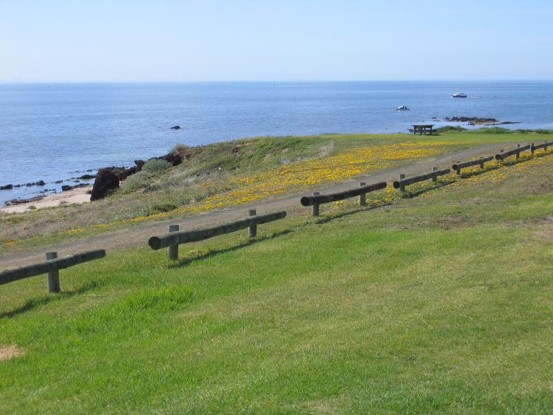 Portarlington - The Esplanade coastal road: View east along coast from The Esplanade at Batman St