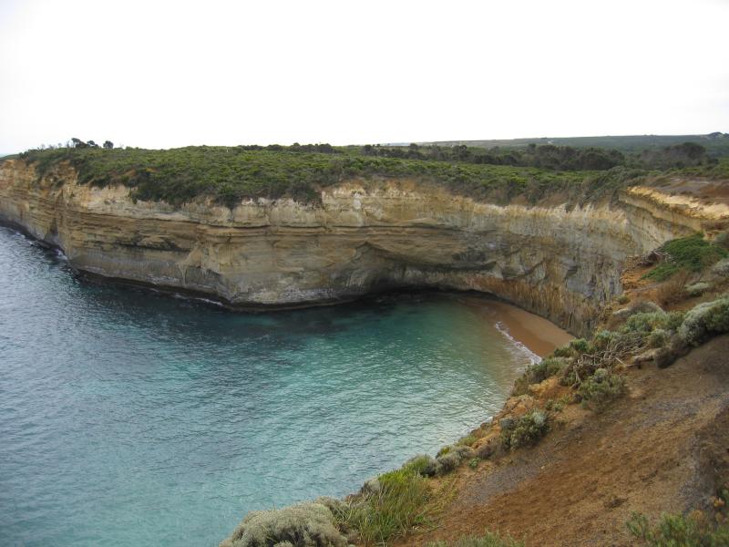 Port Campbell - Loch Ard Gorge, Muttonbird Island, Blow Hole, Thunder Cave: View west along cliffs and to beach from Island Arch circuit track