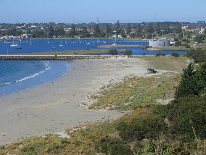 Portland - Foreshore along Bentinck Street above Nuns Beach and marina: View south along Nuns Beach towards S.L. Patterson Tanker Berth