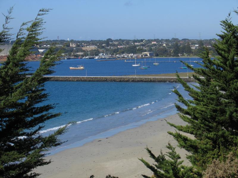 Portland - Foreshore along Bentinck Street above Nuns Beach and marina: View across Nuns Beach towards S.L. Patterson Tanker Berth