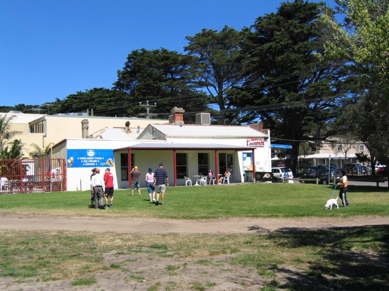 Portsea - Shops and commercial centre, Point Nepean Road: View from gardens near Portsea Pier towards shops on Point Nepean Rd