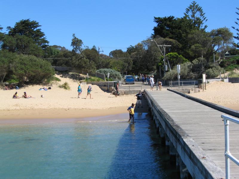 Portsea - Portsea Pier and foreshore at Weeroona Bay: View along pier back to coast