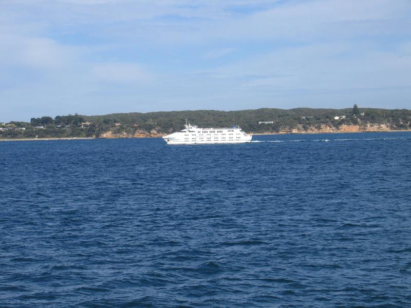 Portsea - Point Nepean: View towards Mornington Peninsula National Park at Police Point with the Queenscliff to Sorrento Ferry passing