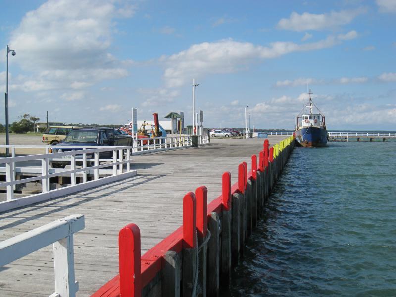Port Welshpool - Port Welshpool Wharf and surrounding foreshore, Lewis Street near eastern end: View east along wharf