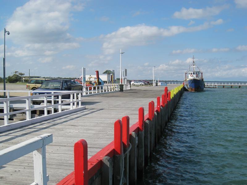 Port Welshpool - Port Welshpool Wharf and surrounding foreshore, Lewis Street near eastern end - View east along wharf