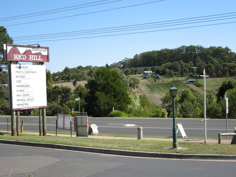 Red Hill - Shops, Red Hill Centrepoint, Shoreham Road: View west across Shoreham Rd at shopping centre car park