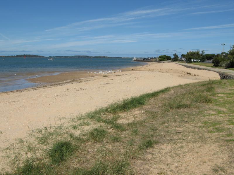 Rhyll - Shops and coast along Beach Road between Reid Street and boat ramp: View south along coast near Lock Rd